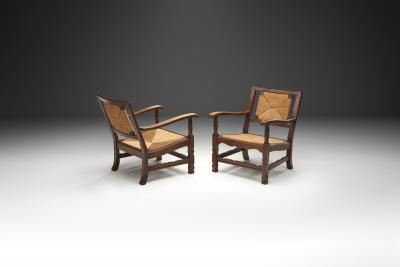 Mid Century Handcrafted Wood and Woven Straw Armchairs Europe ca 1950s