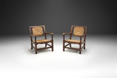 Mid Century Handcrafted Wood and Woven Straw Armchairs Europe ca 1950s