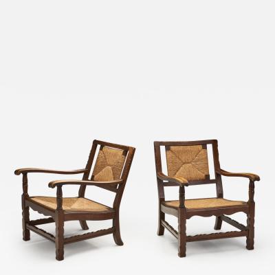 Mid Century Handcrafted Wood and Woven Straw Armchairs Europe ca 1950s