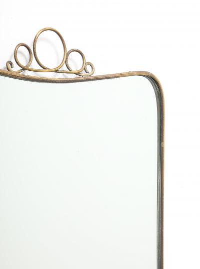 Mid Century Italian Modernist Shaped Brass Mirror with Scroll Crest