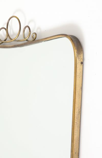Mid Century Italian Modernist Shaped Brass Mirror with Scroll Crest