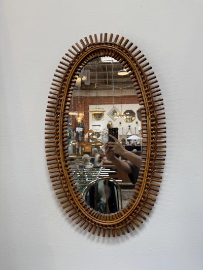 Mid Century Italian Oval Rattan and Wicker Sunburst Mirror 1960s