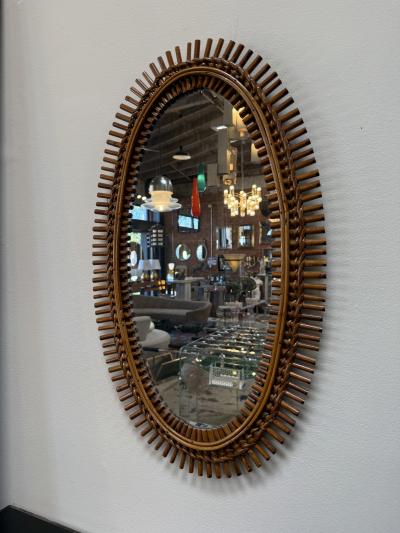 Mid Century Italian Oval Rattan and Wicker Sunburst Mirror 1960s