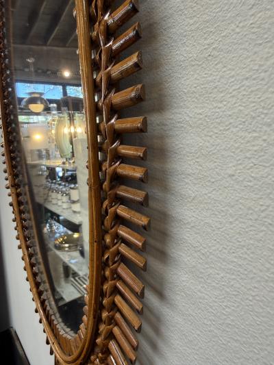 Mid Century Italian Oval Rattan and Wicker Sunburst Mirror 1960s