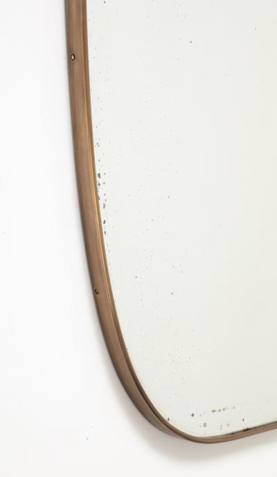 Mid Century Italian Shield Shaped Brass Wall Mirror with Scroll Crest