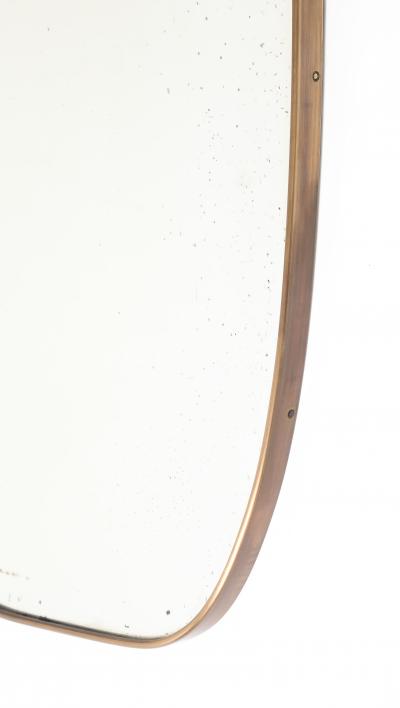 Mid Century Italian Shield Shaped Brass Wall Mirror with Scroll Crest