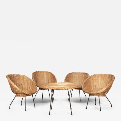 Mid Century Italian Wicker Salon Set Four Lounge Chairs and Circular Table