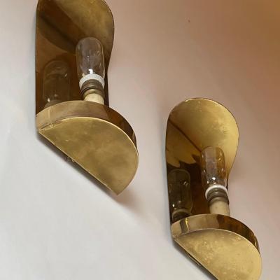 Mid Century Modern Pair of Curved Brass Sconces