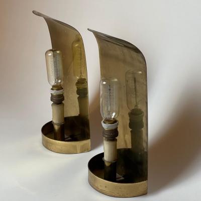 Mid Century Modern Pair of Curved Brass Sconces