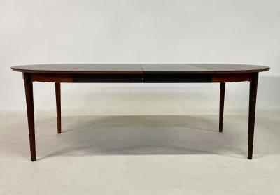 Mid Century Modern Round Extendable Dining Table