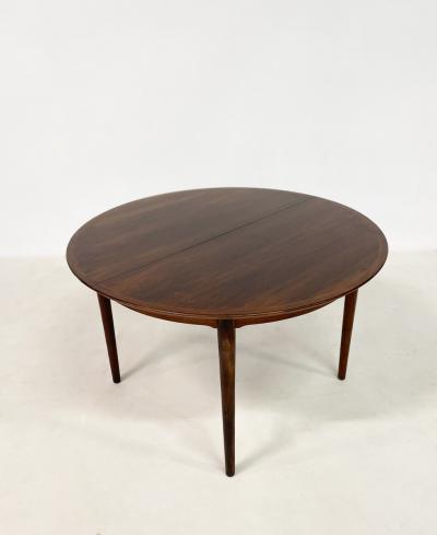 Mid Century Modern Round Extendable Dining Table