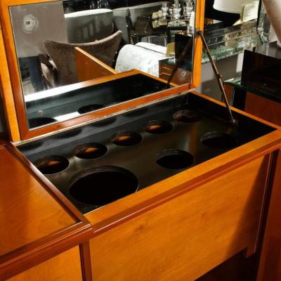 Mid Century Modernist Bar Cabinet in Book Matched Walnut with Inset Glass Pulls
