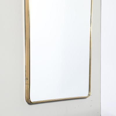Mid Century Modernist Elongated Brass Wrapped Mirror with Curved Top Detailing