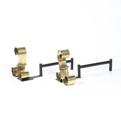 Mid Century Modernist Scroll Form Andirons in Polished Brass