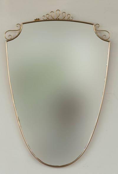 Mid Century Oval Shield Shaped Mirror With Decorative Scrolls