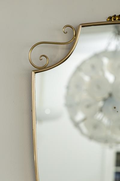 Mid Century Oval Shield Shaped Mirror With Decorative Scrolls