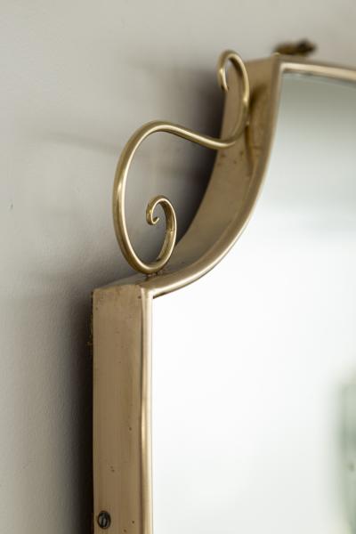 Mid Century Oval Shield Shaped Mirror With Decorative Scrolls