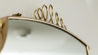 Mid Century Oval Shield Shaped Mirror With Decorative Scrolls