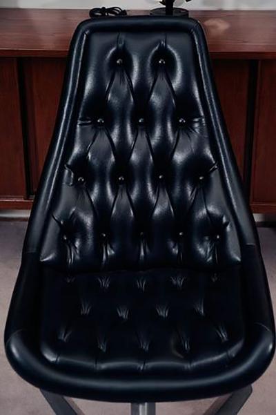 Mid Century Pair of Black Vinyl Unicorn Chairs