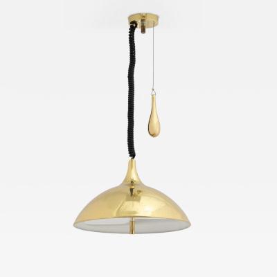 Mid Century Pierced Brass Pendant Light in the Style of Paavo Tynell