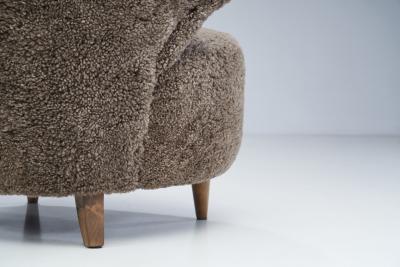 Mid Century Scandinavian Lounge Chair in Sheepskin Scandinavia circa 1950s