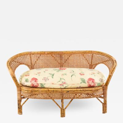 Mid Century Wicker Love Seat with Floral Upholstery