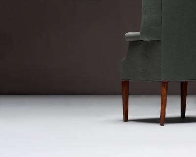Mid Century Wingback Chair with Brass Buttons United States c 1950