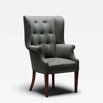 Mid Century Wingback Chair with Brass Buttons United States c 1950