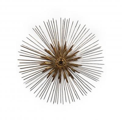 Mid Century gilt metal sunburst with spoke and wheat design