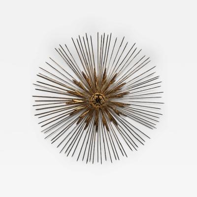 Mid Century gilt metal sunburst with spoke and wheat design