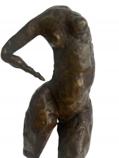 Mid Century small bronze contorting female nude on a wood base