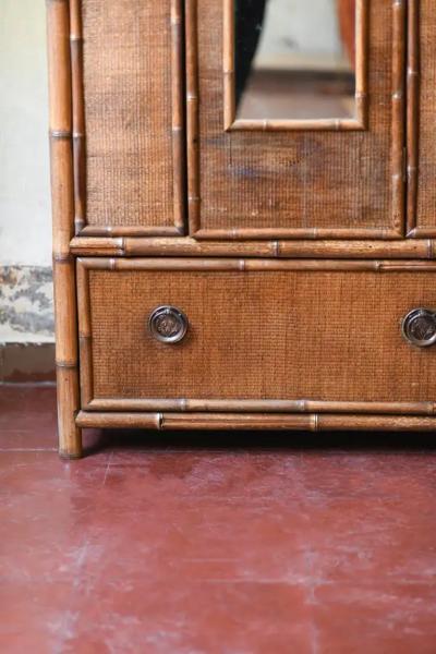 Mid Century wardrobe in bamboo cane and woven rattan with brass details
