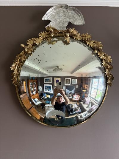Mid century convex mirror with crystal Eagle and gilt metal oak leaf detail