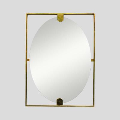 Mid century style rectangular brass frame with oval mirror