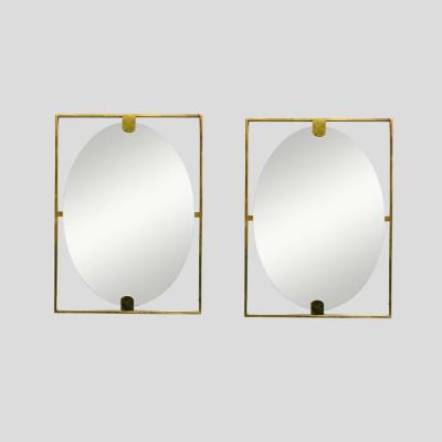 Mid century style rectangular brass frame with oval mirror