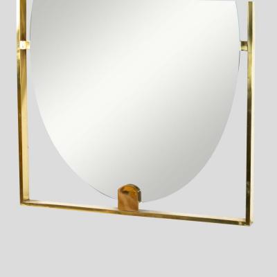 Mid century style rectangular brass frame with oval mirror