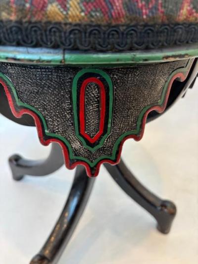Middle Eastern style ebonized stool with tapestry round seat