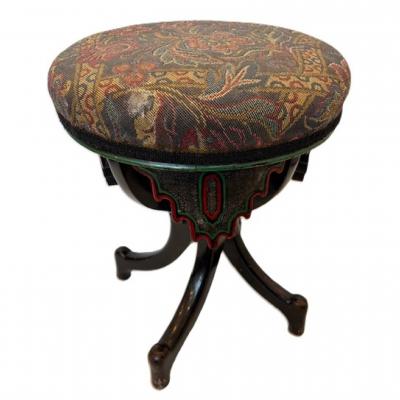 Middle Eastern style ebonized stool with tapestry round seat