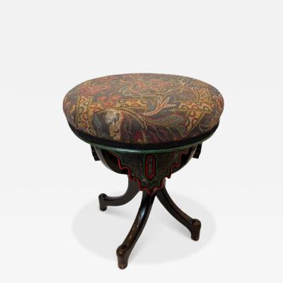 Middle Eastern style ebonized stool with tapestry round seat