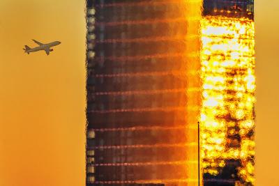 Mitchell Funk Urban Landscape Golden Sky with Melting and Dissolving Glass Skyscraper