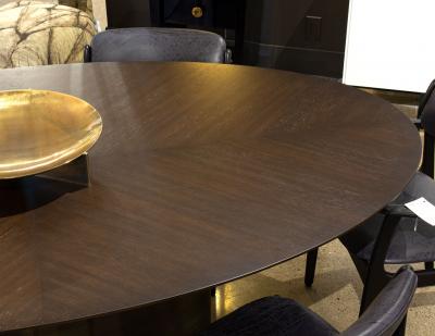 Modern Oval Oak Dining Table with Curved Metal Pedestals