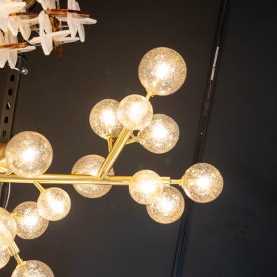 Modernist Brass Snowflake Chandelier with 24 Karat Gold Hand Blown Murano Globes