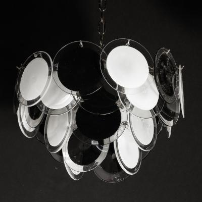 Modernist Four Tier Black and White Hand Blown Murano Disk Chandelier