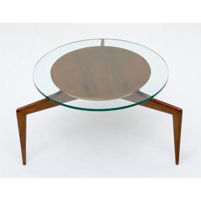 Modernist side table with glass top