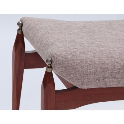 Modernist stool with brass finials