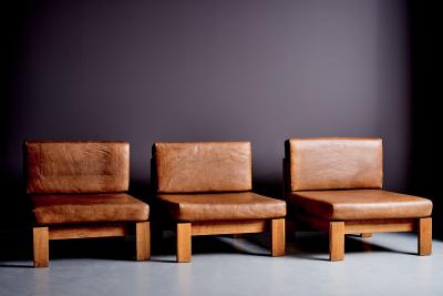 Modular seating group of three lounge chairs in oak and leather