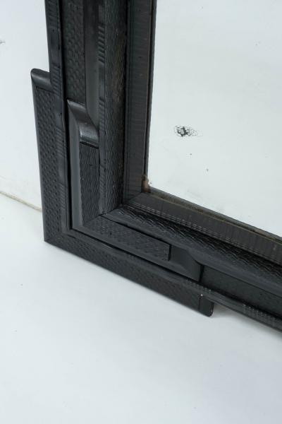 Monumental 19th Century Ebonized Ripple Molded Mirror