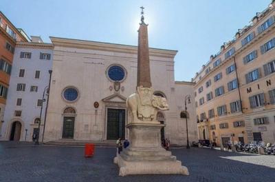 Monumental Pair of Italian Carved Stone Obelisks with Elephants