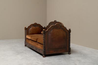 Monumental Sofa in Patinated Brown Leather Studs and Velvet Late 19th Century