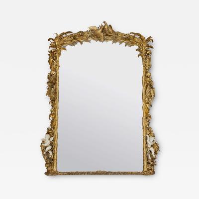 Monumental antique Rococo style carved giltwood mirror